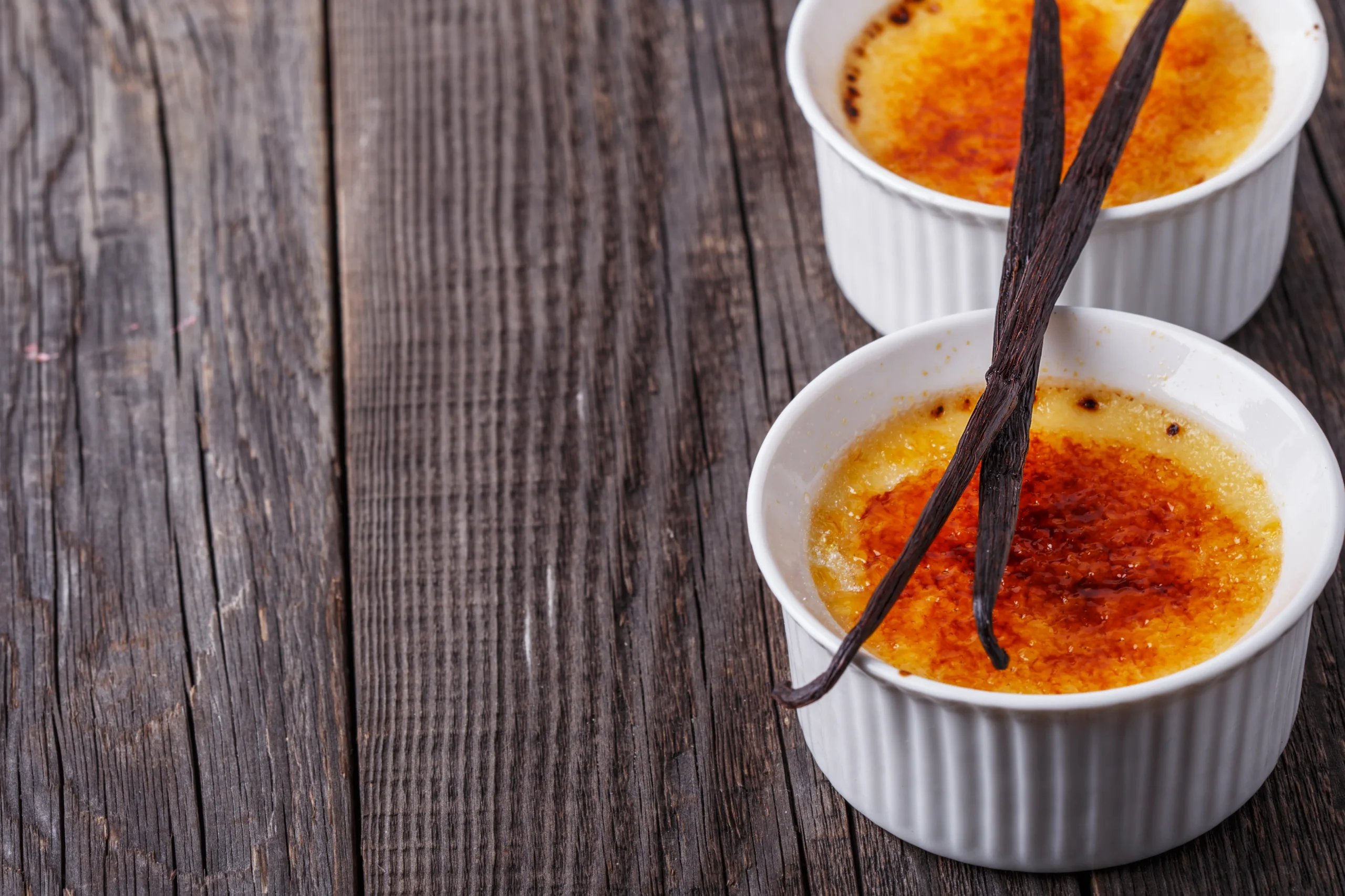 Classic crème brûlée dessert with a caramelized sugar topping