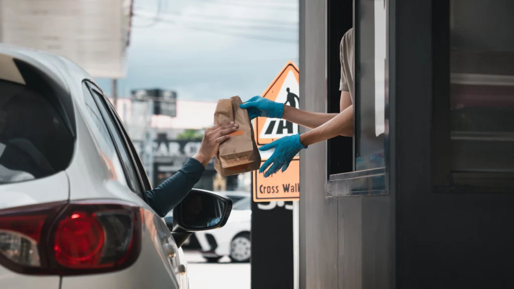 Burger King drive-thru with a customer picking up breakfast